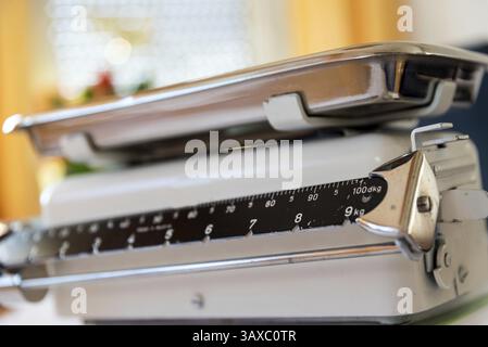 Kitchen scales - old mechanical scales with weighing pan, retro Stock Photo