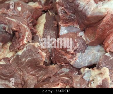Pork, cut into pieces. Raw pork meat. Pork, cut into pieces. Raw pork meat. Stock Photo