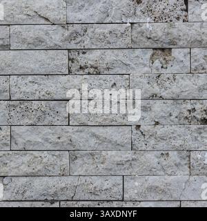 Wall of bricks in Vulcanic Stone, useful for background Stock Photo