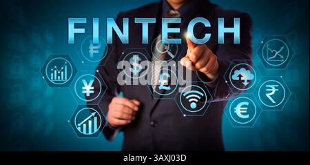 Unrecognizable business services manager touching FINTECH on an interactive screen. Business metaphor and computing concept for financial technology a Stock Photo