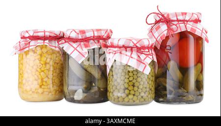 Many jars with different pickled products isolated on white Stock Photo