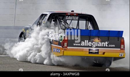 November 4, 2016 - Fort Worth, TX, USA - Johnny Sauter (21) boils the tires near the starting line after winning the 18th Annual Striping Technology 350, part of the NASCAR Camping World World Truck Series, at Texas Motor Speedway in Fort Worth, Texas, on Friday, Nov. 4, 2016. (Credit Image: © Paul Moseley/TNS via ZUMA Wire) Stock Photo