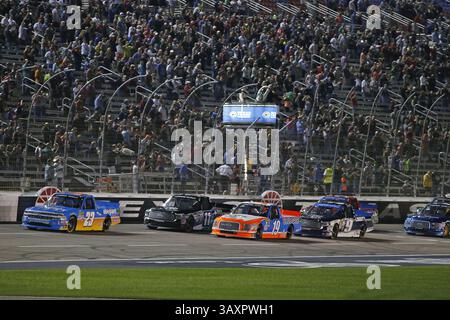 November 4, 2016 - Fort Worth, TX, USA - Spencer Gallagher (23) leads the field across the starting line for the start of the 18th Annual Striping Technology 350, part of the NASCAR Camping World World Truck Series, at Texas Motor Speedway in Fort Worth, Texas, on Friday, Nov. 4, 2016. (Credit Image: © Paul Moseley/TNS via ZUMA Wire) Stock Photo