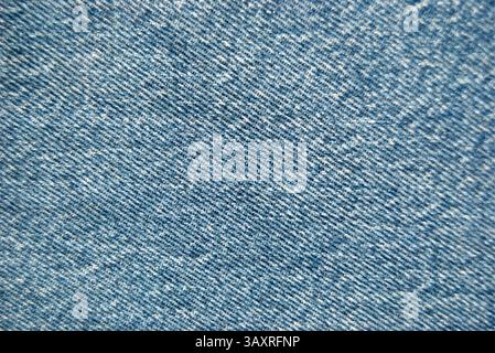 Blue fabric texture. Blue denim close-up. Blue denim background in vector. Stock Vector