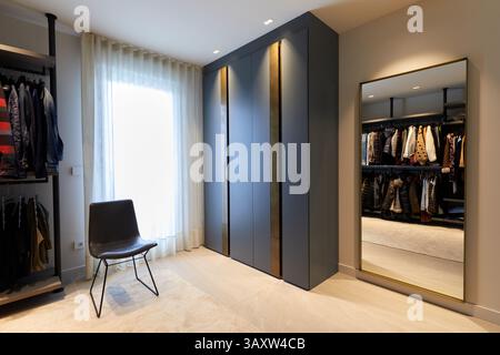 Black wardrobe in a young person's bedroom, interior design, Home, Basque Country, Spain Stock Photo
