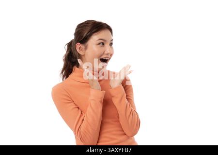 beautiful woman exited surprise face expression . female feels shocked with the phone. exciting smile and happy adorable rejoices. Very enjoy and fun Stock Photo