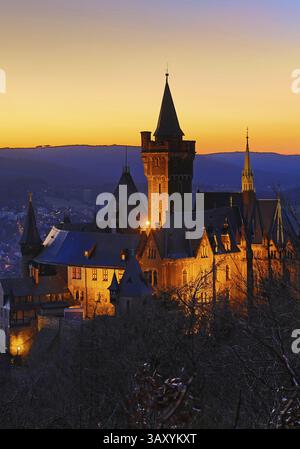 Atmospheric view of the illuminated Wernigerode Castle at sunset, Harz Mountains, Saxony-Anhalt, Germany, Europe Stock Photo