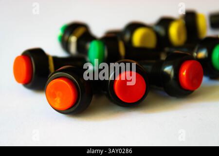 Colorful Panel Push Buttons on White Surface Stock Photo