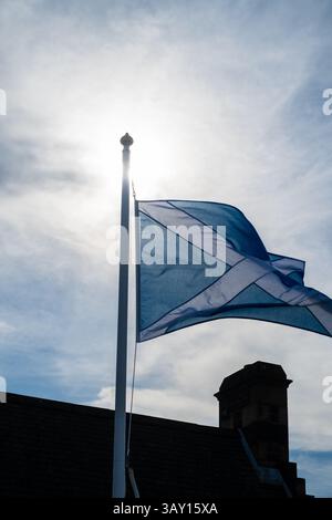 The Cross Of St Andrew flag ( Scottish flag ) at Edinburgh Castle, Scotland Stock Photo
