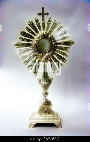 A beautifully ornate monstrance, featuring a sunburst design with intricate details, holds a central circular compartment designed for displaying the Eucharist, symbolizing reverence and spirituality., Francois Sasseville, Canadian, 1797-1864, Monstrance, ca. 1850, silver, Overall: 26 1/8 × 13 3/4 inches (66.4 × 34.9 cm), Classic art with a modern twist reimagined by Artotop Stock Photo