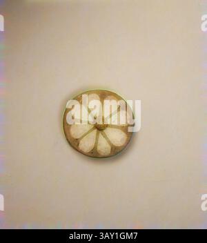 A circular object with a floral pattern features petal shapes radiating from a central point, displaying soft and muted colors that create a harmonious design., Egyptian, Wall Tile, 12th Century BC, Faience, Height x Diameter: 3/8 x 1 1/4 in. (1.0 x 3.2 cm), Classic art with a modern twist reimagined by Artotop Stock Photo