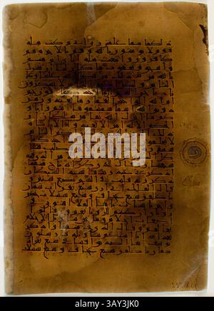 A Qur'an manuscript folio featuring Islamic calligraphy and decoration ...