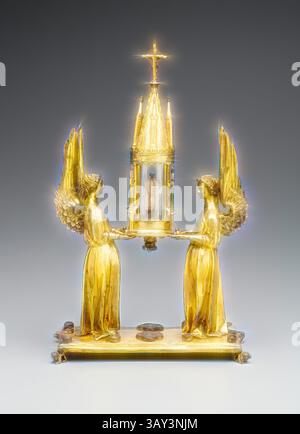 An intricate golden altar piece featuring two angelic figures with detailed wings, each holding a central structure adorned with a cross and displaying a sacred figure within. The craftsmanship highlights a blend of spirituality and artistry, creating a serene and reverent atmosphere., Unknown (French), Reliquary, late 13th century, Gilt copper, rock crystal, enamel and glass, Overall: 16 × 10 × 4 3/4 inches (40.6 × 25.4 × 12.1 cm), Classic art with a modern twist reimagined by Artotop Stock Photo