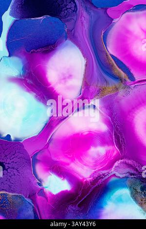 Exquisite abstract ink artwork showcasing a fluid blend of vivid blue, pink, purple, and hints of gold on a smooth surface, ideal for vivid artistic b Stock Photo