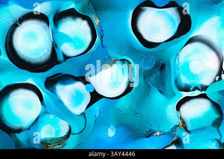 A captivating abstract artwork showcasing blue bubbles in fluid form, blending vibrant turquoise and white hues. Perfect for backgrounds or creative p Stock Photo