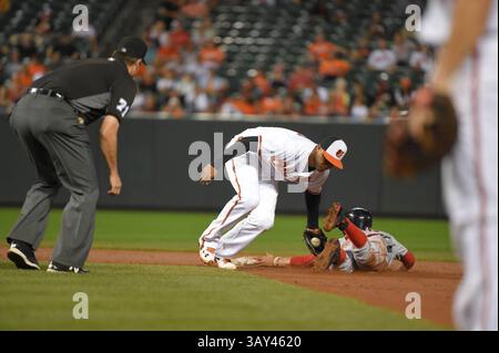 Boston Red Sox's Mookie Betts flips his bat after hitting a