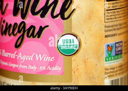 A USDA Organic logo on a foodstuff bottle. The certification informs consumers the item was grown and processed according to standards for organic ... Stock Photo