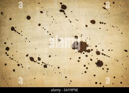 Ink splash over vintage paper, black watercolour splatter background. Stock Photo