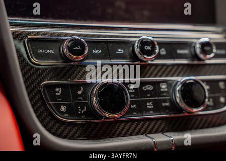 Close Up of Bentley Bentayga Control Panel with Carbon Fiber Trim Stock Photo