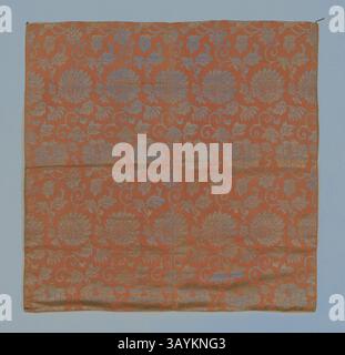 An intricately designed textile featuring ornate floral patterns in rich orange and delicate silver. The elegant motifs of flowers and swirling vines create a visually captivating texture, showcasing traditional craftsmanship. Uchishiki (Altar Cloth), Edo period (1615–1868), 1801/25, Japan, Square piece of kinran, plain compound silk of orange-brown ground with pattern woven in gilded paper strips finely cut, representing chrysanthemum and peony scrolls, lined with white linen, 66.7 x 67.0 cm (26 1/4 x 26 3/8 in.)  Classic art with a modern twist reimagined by Artotop Stock Photo