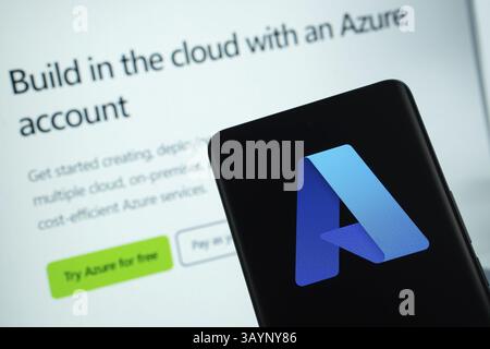 Dhaka, Bangladesh - 17 March 2025: The logo of the microsoft azure is displayed on a smartphone screen, and the website microsoft azure is visible on Stock Photo