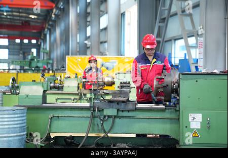 Machining Process on Lathe in Industrial Workshop - Precision Manufacturing Stock Photo