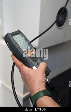 Servicing a modern Worcester gas combi boiler Stock Photo