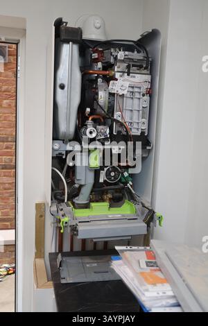 Servicing a modern Worcester gas combi boiler Stock Photo