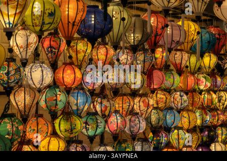 Traditional multi-colored Vietnamese lanterns hanging on the streets of Hoi An Stock Photo