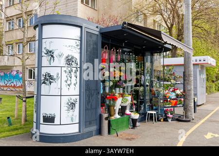 Typical small flower shop at a street corner in Bucharest, Romania Stock Photo
