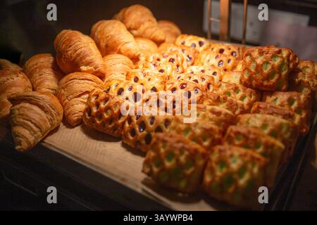 Variety of Pastries under heat lamp Stock Photo