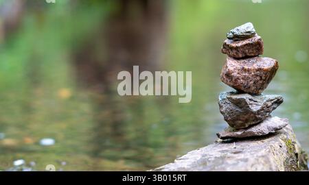 balance stones on the water Zen Like Stock Photo