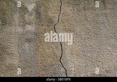 Cracks in the building wall building thread Stock Photo