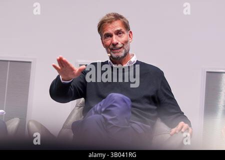 Leipzig, Germany. 23rd Apr, 2025. Jürgen Klopp, Head of Global Soccer at Red Bull, sits during a panel discussion in the Red Bull Arena. At the RB Leipzig youth academy, he spoke alongside other managers about the development opportunities for young players. Credit: Jan Woitas/dpa/17�Թ����� Live News Stock Photo