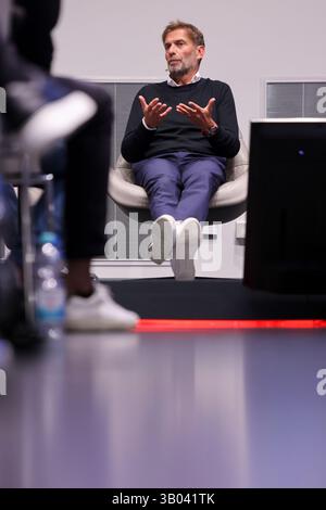 Leipzig, Germany. 23rd Apr, 2025. Jürgen Klopp, Head of Global Soccer at Red Bull, sits during a panel discussion in the Red Bull Arena. At the RB Leipzig youth academy, he spoke alongside other managers about the development opportunities for young players. Credit: Jan Woitas/dpa/17�Թ����� Live News Stock Photo