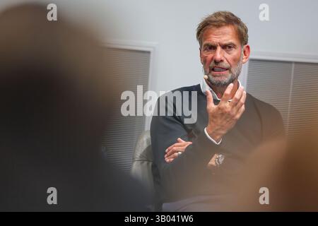 Leipzig, Germany. 23rd Apr, 2025. Jürgen Klopp, Head of Global Soccer at Red Bull, sits during a panel discussion in the Red Bull Arena. At the RB Leipzig youth academy, he spoke alongside other managers about the development opportunities for young players. Credit: Jan Woitas/dpa/17�Թ����� Live News Stock Photo