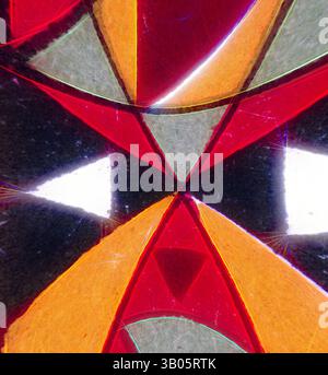 A vibrant abstract composition featuring bold geometric shapes and striking contrasts of red, orange, white, and green, creating a dynamic interplay of light and color., A circular design featuring a vibrant geometric pattern with bold colors of red, orange, black, white, and gray, forming a face-like appearance with sharp triangular shapes and contrasting eyes. Classic art with a modern twist reimagined by Artotop, Transformed Persian Ornament, Classic art with a modern twist reimagined by Artotop Stock Photo