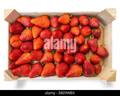 Ripe strawberries arranged in wooden crate isolated on white with clipping path included Stock Photo