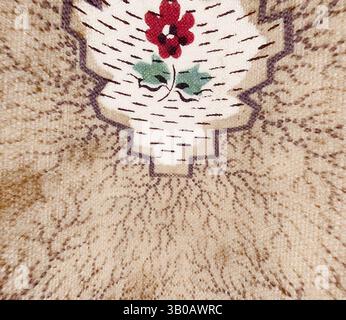 A detailed textile design featuring a central floral motif with a vibrant red flower and green leaves, surrounded by intricate patterns that add elegance and texture., This design features an intricate floral pattern with muted colors on a textured background, displaying symmetrical motifs that create a sense of elegance and warmth. Classic art with a modern twist reimagined by Artotop, Transformed French Fabrics, First Half of the Nineteenth Century, Classic art with a modern twist reimagined by Artotop Stock Photo