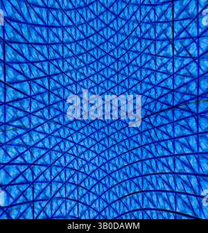 A dynamic pattern of intersecting lines and shapes creates a striking geometric design, evoking a sense of depth and structure. The blue tones enhance the visual complexity, inviting exploration of the intricate latticework above., A circular plate featuring an intricate geometric pattern, showcasing a vivid blue hue and a textured surface made up of small triangles. Classic art with a modern twist reimagined by Artotop, Transformed French Fabrics, First Half of the Nineteenth Century, Classic art with a modern twist reimagined by Artotop Stock Photo