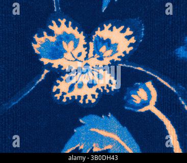 A close-up view of a floral pattern featuring detailed blue and white blossoms with intricate designs and textures on fabric., A vibrant floral pattern featuring intricate blue leaves and orange blossoms, elegantly arranged against a deep navy background. Classic art with a modern twist reimagined by Artotop, Transformed French Fabrics, First Half of the Nineteenth Century, Classic art with a modern twist reimagined by Artotop Stock Photo