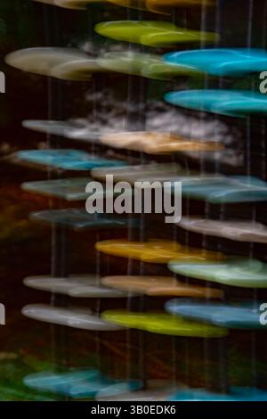 abstract motion blur  of colored tiles stacked upright special effect created with long shutter speed and ICM or intentional camera movement creating Stock Photo