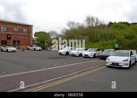 Pre owned, or used, tesla electric cars on sale at a Tesla dealer in Bristol UK, April 2025 Stock Photo