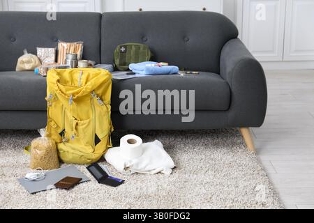 Survival kit. Different emergency supplies at home Stock Photo
