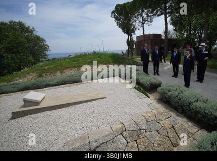 The Princess Royal, President of the Commonwealth War Graves Commission, at the grave in Sedd el Bahr of Lieutenant Colonel Charles Doughty-Wylie VC of the Royal Welch Fusiliers - who was posthumously awarded the Victoria Cross for service at Gallipoli - laying a wreath and card on behalf of King Charles III, Colonel-in-Chief of The Royal Welsh. Princess Anne is in Turkey to mark Anzac Day, which commemorates the anniversary of the start of the Gallipoli landings, and is a national day of remembrance for Australia and New Zealand. Picture date: Thursday April 24, 2025. Stock Photo