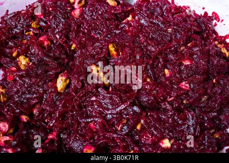 Beetroot salad with walnut kernels. Healthy salad to raise hemoglobin. Stock Photo