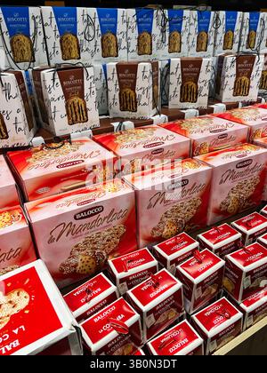 Kyiv, Ukraine - April 23, 2025: Assorted packaged festive sweet bread displayed in a store setting, showcasing colorful boxes. Stock Photo