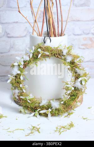 Snowdrop wreath. Winter decoration with snowdrops on moss. UK Stock Photo