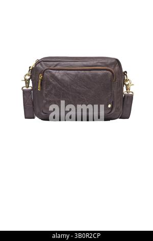 an attractive brown leather crossbody bag featuring a zippered pocket and gold hardware this fashionable and stylish womens accessory is perfect for e Stock Photo