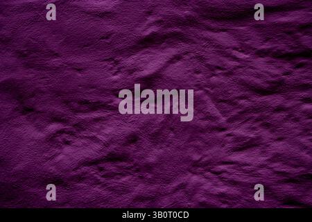 Purple textured surface with intricate natural patterns, suitable for backgrounds or design projects. This abstract material emphasizes a unique tacti Stock Photo